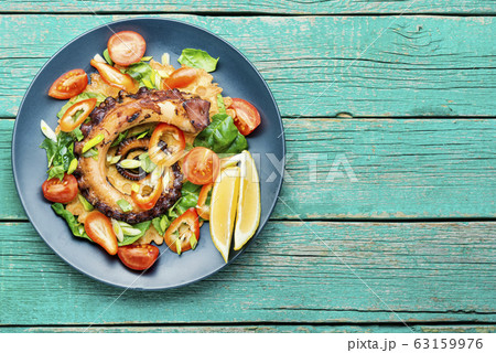 Salad with vegetables and octopus 63159976