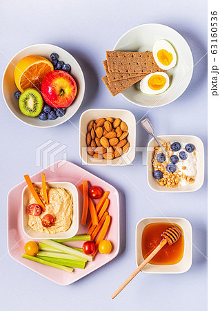 Healthy snack on a pastel background. 63160536