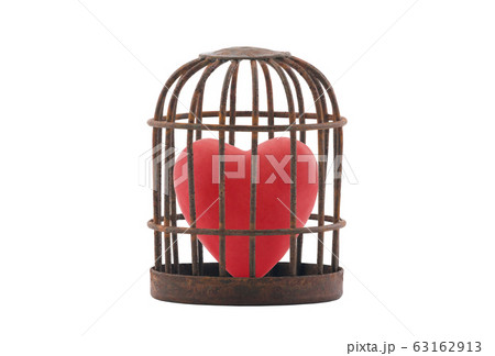 Red heart trapped in retro rusty cage isolated on white background Red heart trapped in retro rusty cage isolated on white background 63162913