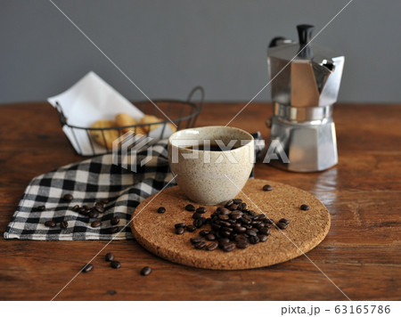 Moka pot coffee maker and coffee cup, steel 63165786