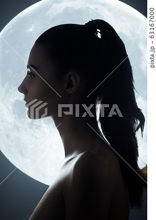 Fine Art Fashion Studio Portrait of Woman at Full Moon 63167000