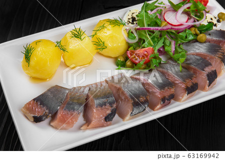 Sliced salted herring Sliced salted herring 63169942