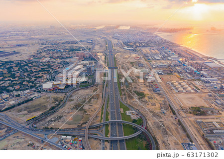 Aerial view of petrochemical oil refinery and sea Aerial view of petrochemical oil refinery and sea 63171302