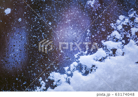 Winter ice patterns on glass. Frost patterns on 63174048