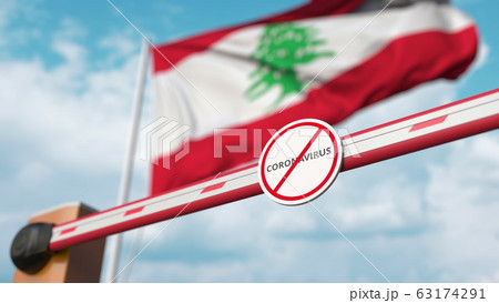 Closing boom barrier with STOP CORONAVIRUS sign against the Lebanese flag. Quarantine in Lebanon. 3D rendering 63174291
