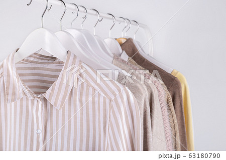 Spring clothes hanging on a rack 63180790