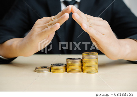 Businessman working with coin money currency. 63183555