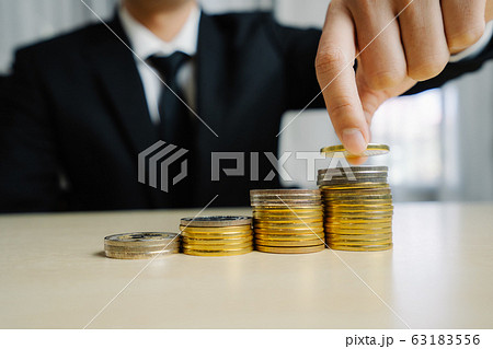 Businessman working with coin money currency. 63183556