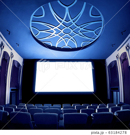 Cinema theater showing empty white movie screen. Cinema theater showing empty white movie screen. 63184278