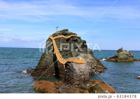 Meoto Iwa "Married Couple Rocks" of Futami, in Mie Japan, a sacred Shinto island Meoto Iwa "Married Couple Rocks" of Futami, in Mie Japan, a sacred Shinto island 63184378