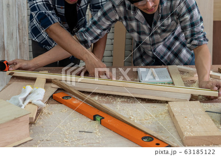 Carpenter working on wood craft at workshop Carpenter working on wood craft at workshop 63185122