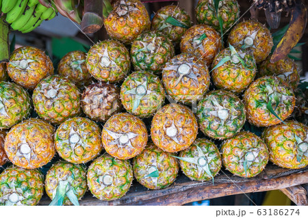 Pineapple stack at grocery 63186274