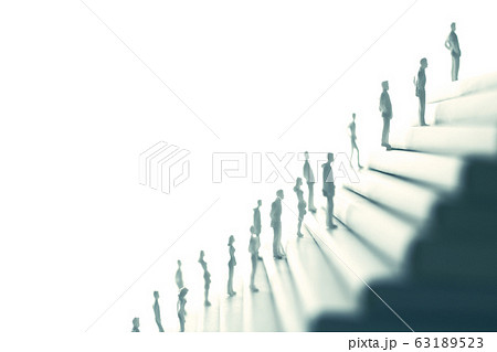 積み重ねた白い本と人間の写真素材