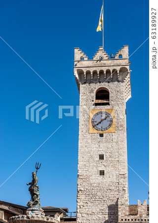 Civic medieval tower and bronze statue of Neptune - Trento Italy Civic medieval tower and bronze statue of Neptune - Trento Italy 63189927