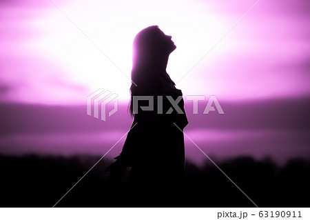 Youth woman soul at pink sun future meditation 63190911