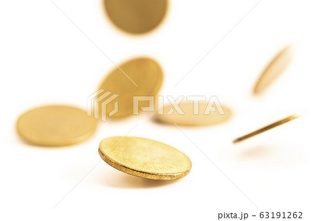 The antique aged gold coin falling down on bright The antique aged gold coin falling down on bright 63191262