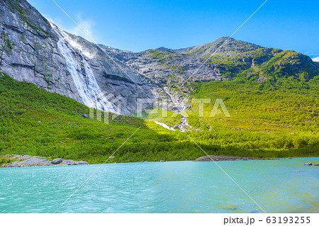 way to Briksdal glacier, waterfall in Norway 63193255