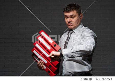 Very busy businessman closeup portrait, posing 63197754
