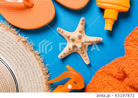 Summer beach flat lay accessories. Sunscreen 63197872