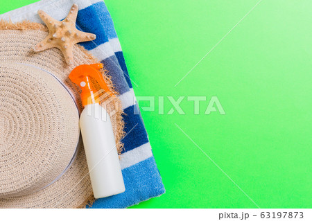 Summer beach flat lay accessories. Sunscreen Summer beach flat lay accessories. Sunscreen 63197873