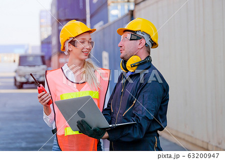 Worker man and woman discuss about their system and express happy emotion 63200947
