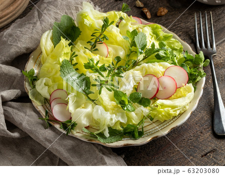 A plate of spring salad with wild edible plants A plate of spring salad with wild edible plants 63203080