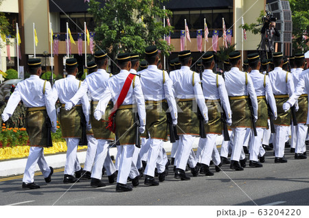 Malaysia Malay soldier with full traditional malay uniform and weapon. Official marching for high command. Marching during Malaysia Independence Day parade 2016. 63204220