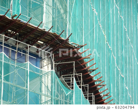 Catch platform or other construction projection from the face of a building. It is protect individuals and property from falling debris during construction.  63204794