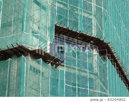 Catch platform or other construction projection from the face of a building. It is protect individuals and property from falling debris during construction.  63204802