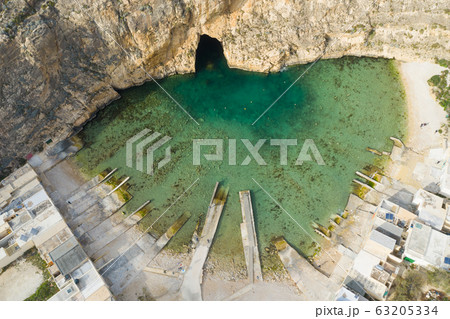 Dwejra is a lagoon of seawater on the island of Dwejra is a lagoon of seawater on the island of 63205334