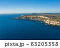 Aerial drone view of rocky coastline and sea. 63205358