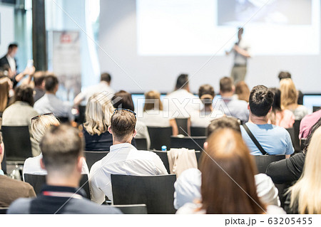 Male business speaker giving a talk at business conference event. Male business speaker giving a talk at business conference event. 63205455