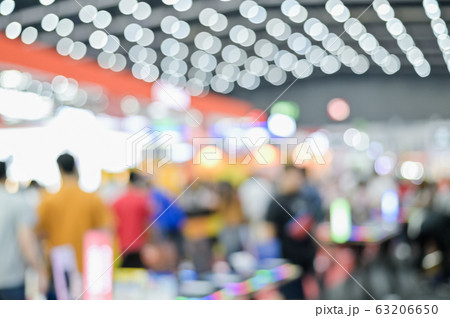 Blurred exhibit showcase background unspecific people Shop in grand sale fair and showcase advertisement Blurred exhibit showcase background unspecific people Shop in grand sale fair and showcase advertisement 63206650