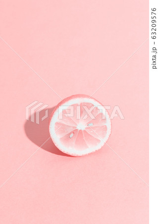 Funny pink monochrome lemon half with seeds. Funny pink monochrome lemon half with seeds. 63209576