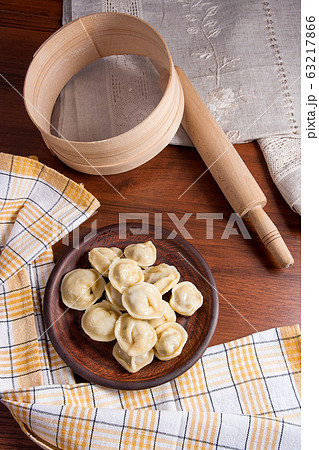 Boiled Ukrainian meat dumplings or ravioli on 63217866