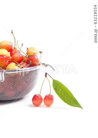 Yellow and red sweet cherry in steel colander Yellow and red sweet cherry in steel colander 63219554