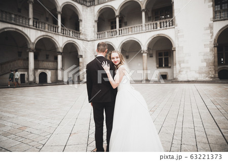 Caucasian happy romantic young couple celebrating their marriage. Outdoor 63221373