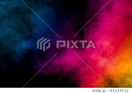 Multi colored particles explosion on black background. Multi colored particles explosion on black background. 63224312