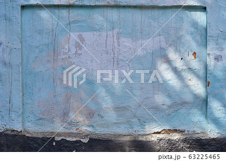 street wall background, aging blue facade of an street wall background, aging blue facade of an 63225465