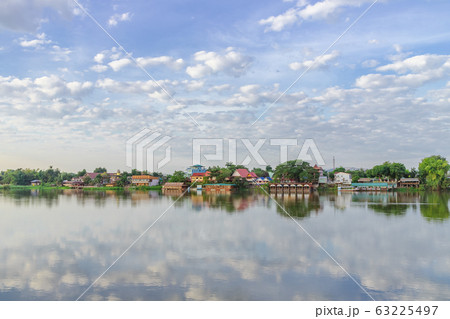 Peaceful Kamphaeng Phet town waterfront on Ping 63225497