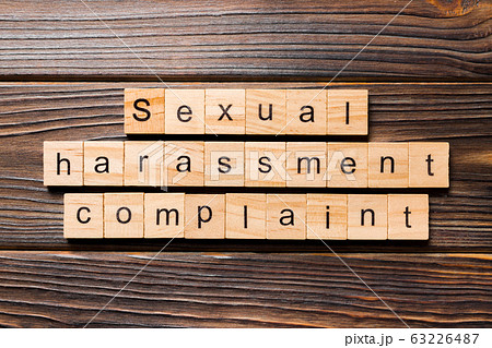Sexual harassment complaint word written on wood Sexual harassment complaint word written on wood 63226487