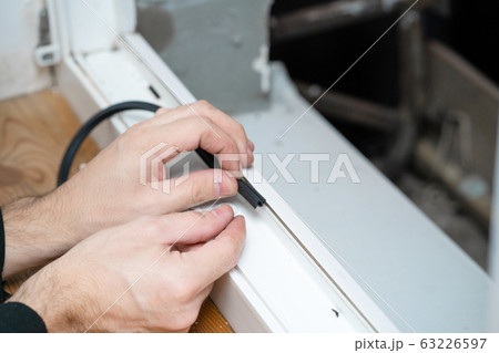 Professional master at repair and installation of 63226597