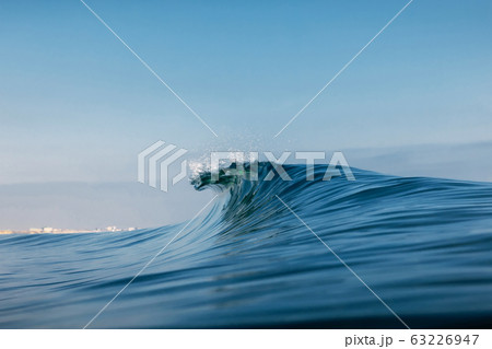 Ocean ideal wave in ocean. Breaking blue waves 63226947