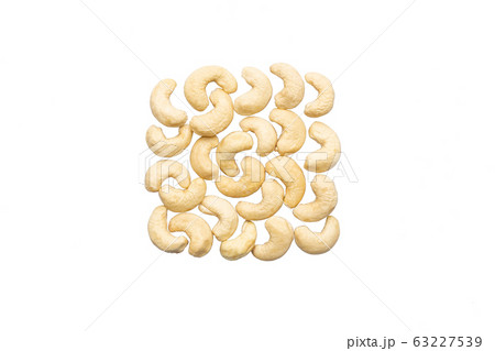 Nut cashew peeled on white background 63227539