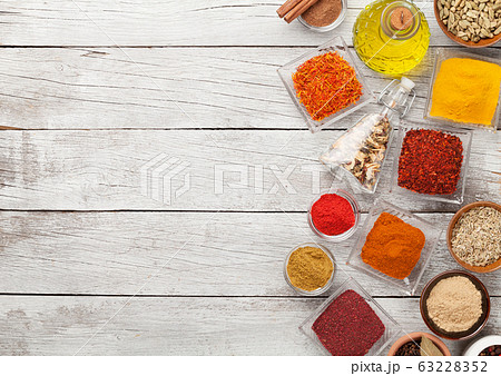 Various spices in bowls 63228352
