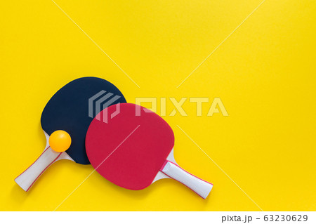 Red and black tennis ping pong rackets isolated Red and black tennis ping pong rackets isolated 63230629