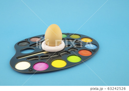 Easter egg decoration concept with paint in pallet 63242526