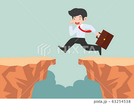 businessman jumping through the gap 63254538