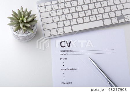 Curriculum vitae with pen on whtie desk 63257908