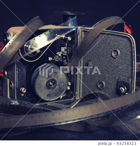 close-up of an old film and the insides of a close-up of an old film and the insides of a 63258321